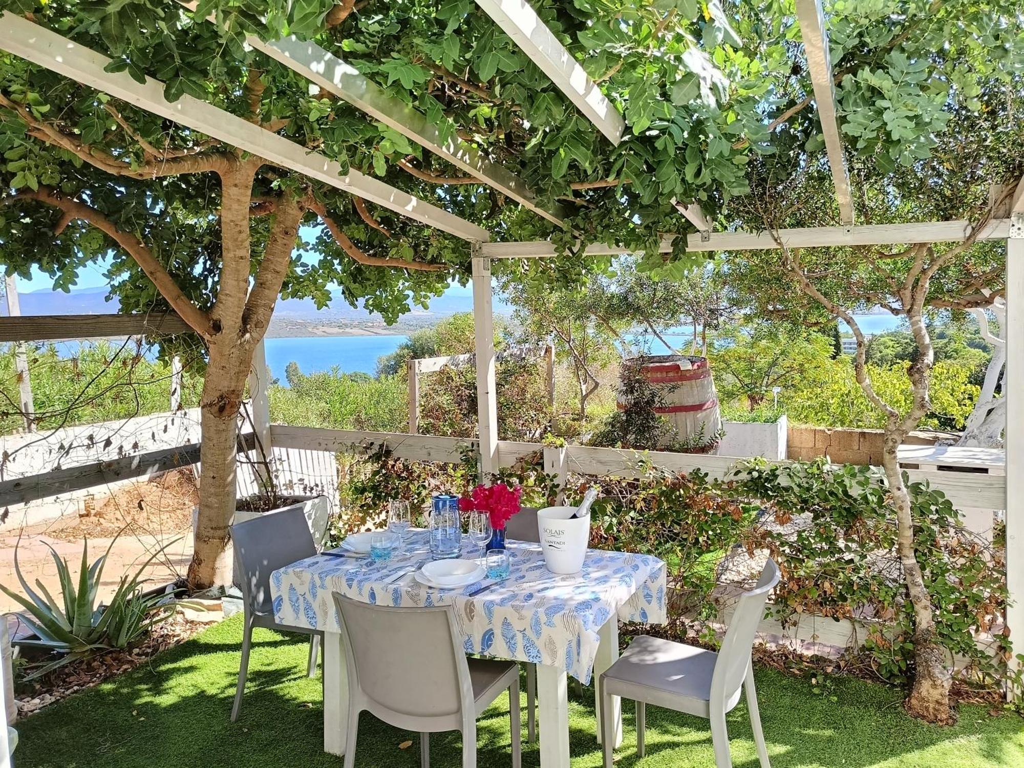 Panohome Porto Pino Exterior photo